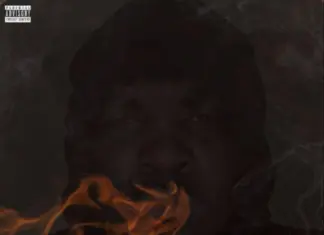 A man with his face in the fire
