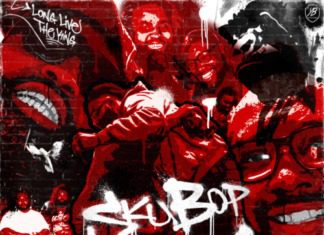 A red graffiti wall with several different types of graffiti.