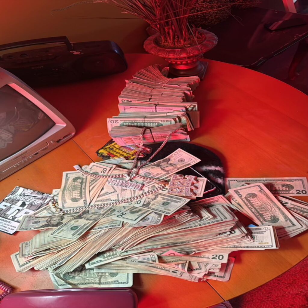 Stacks of US twenty dollar bills on a table.