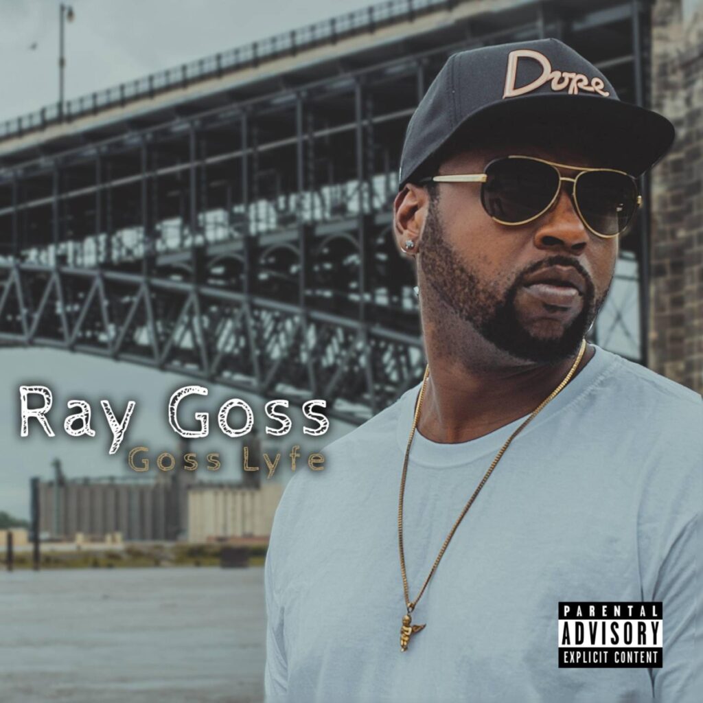 A man wearing a hat and sunglasses with the text Ray Goss, Goss Lyfe.