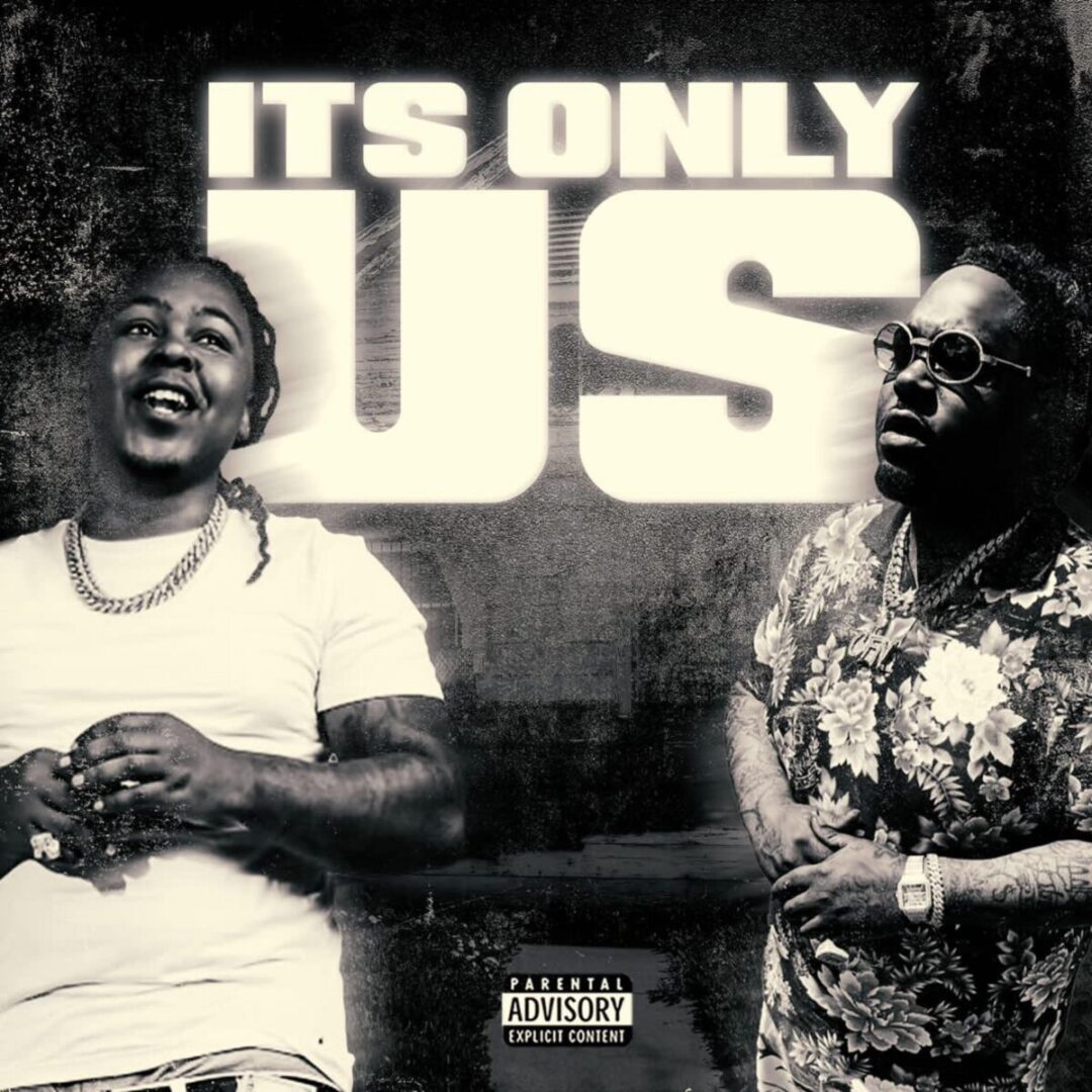 Black-and-white photo of two smiling men with the text "It's Only Us" above them.