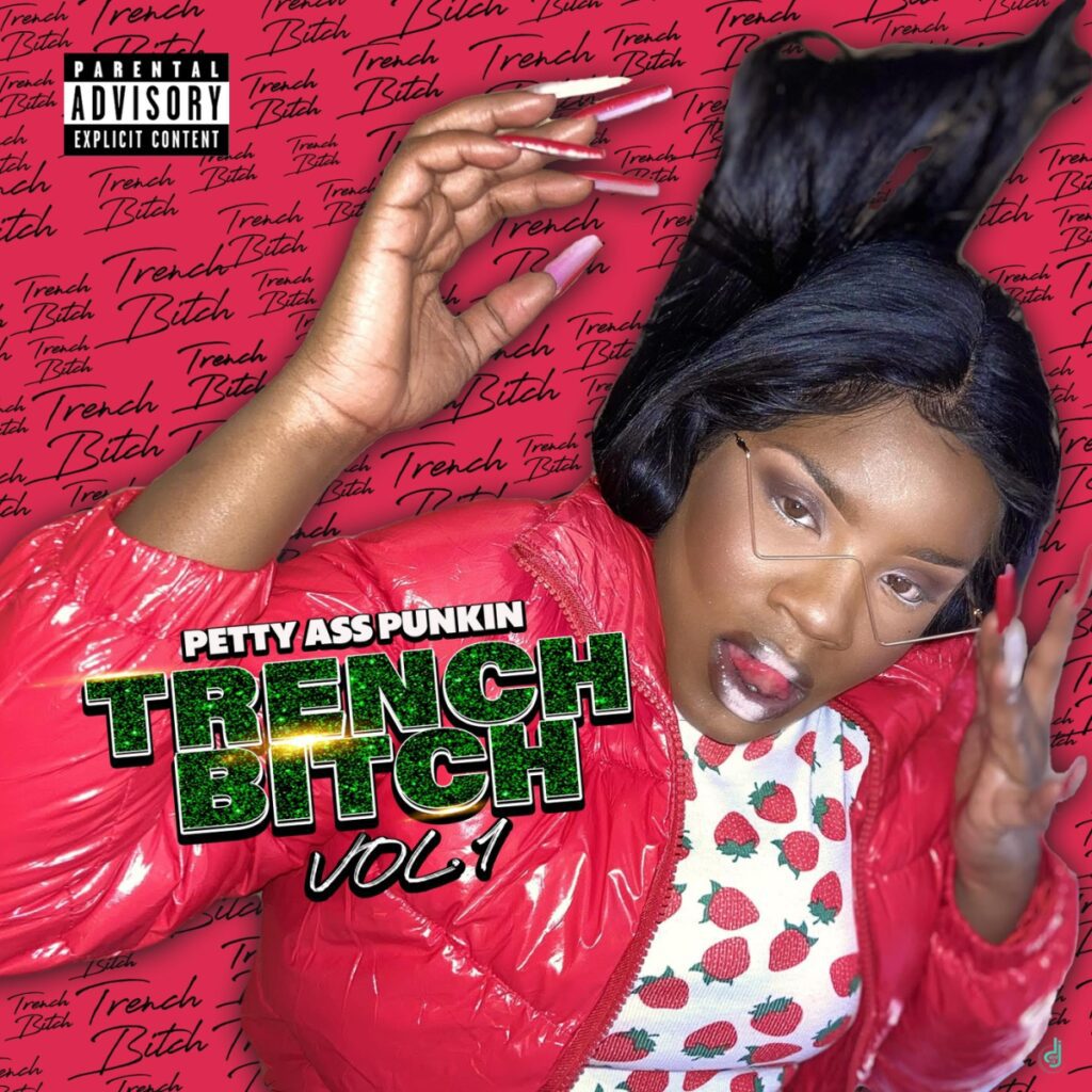 A woman in a red jacket with the text "Trench Bitch" on it.