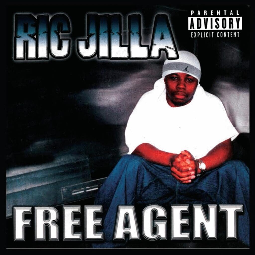 Album cover with seated man, "Free Agent".