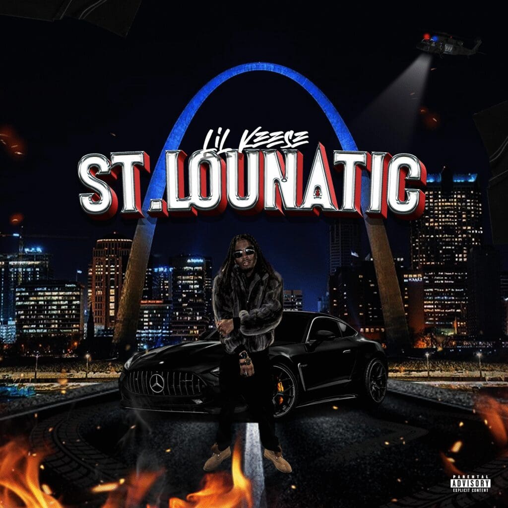 Rapper posing in front of St. Louis skyline.