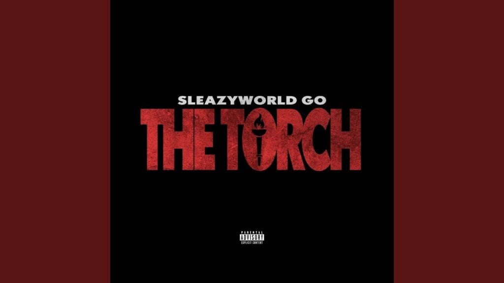 The Torch" album cover with black background.